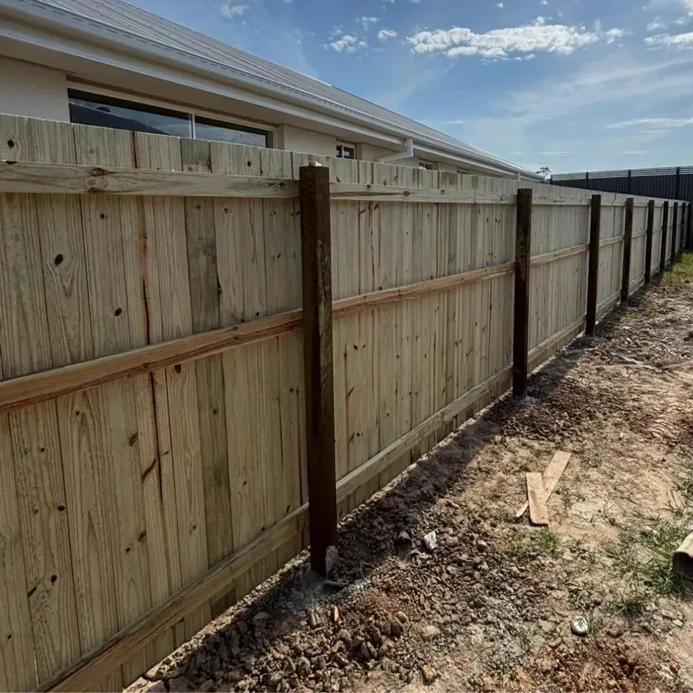 Freshly installed timber fence